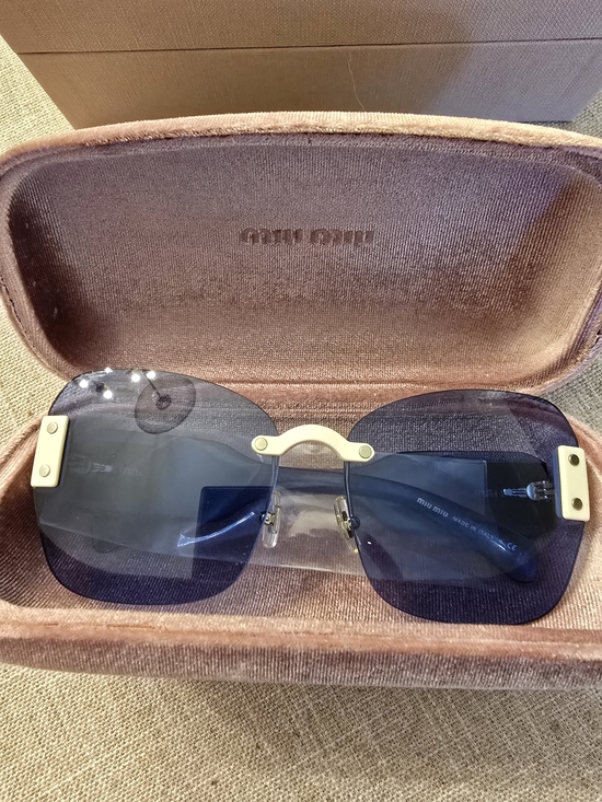 Miu Miu Accessories - Miu Miu Rimless Sunglasses with Blue Lenses and Gold Accents